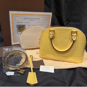 AUTHENTIC LIKE NEW Louis Vuitton Yellow Vernis Alma BB. Date code AA0194.